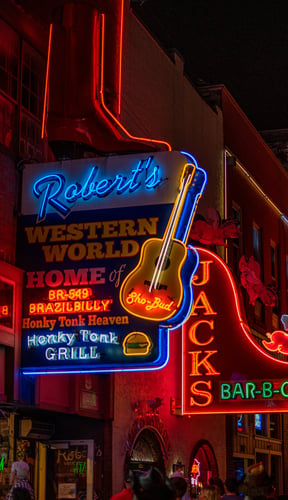 Live-music venues and neon signs on Lower Broadway